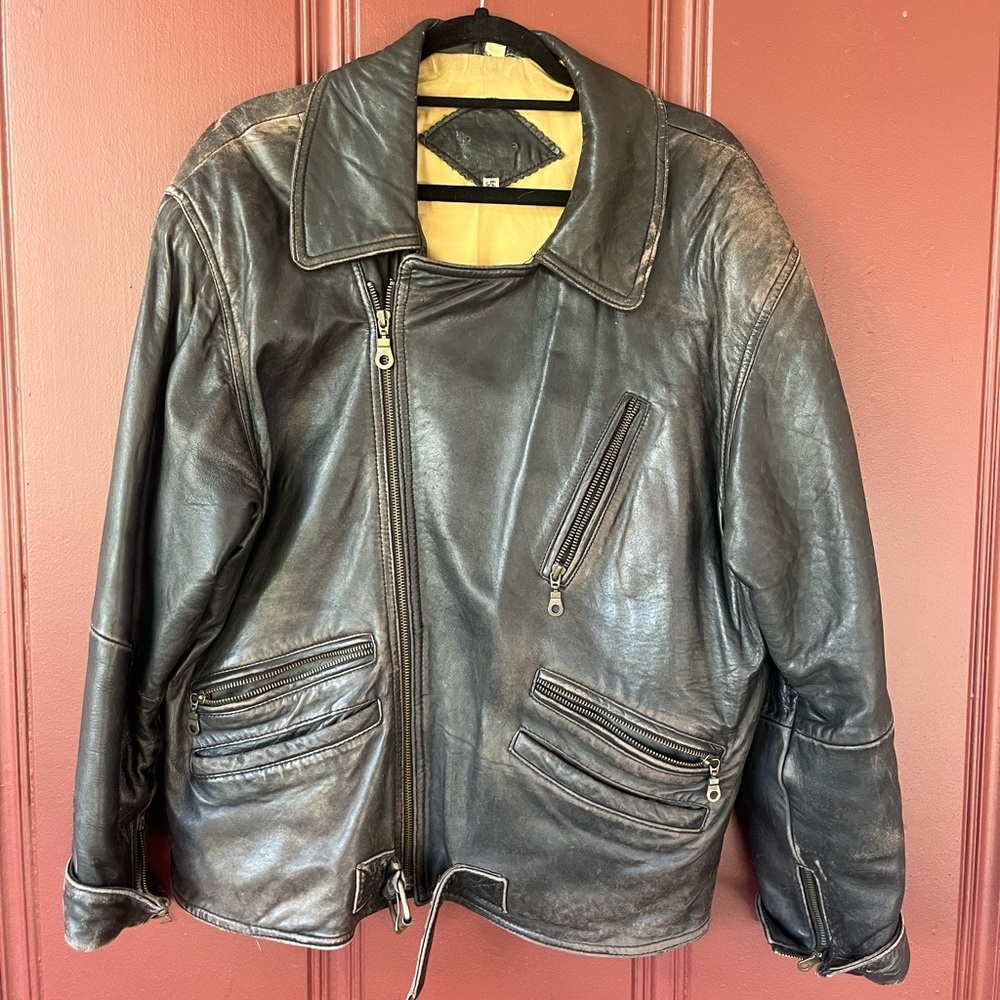 Oversized weathered leather motorcycle jacket